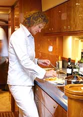 Preparing food in galley of yacht